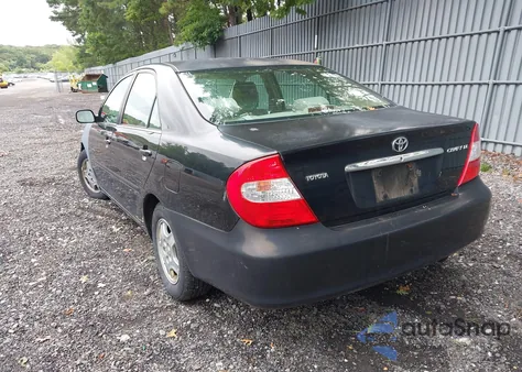2003 Toyota Camry Le z USA, uszkodzony, nr VIN 4T1BE32K83U236639